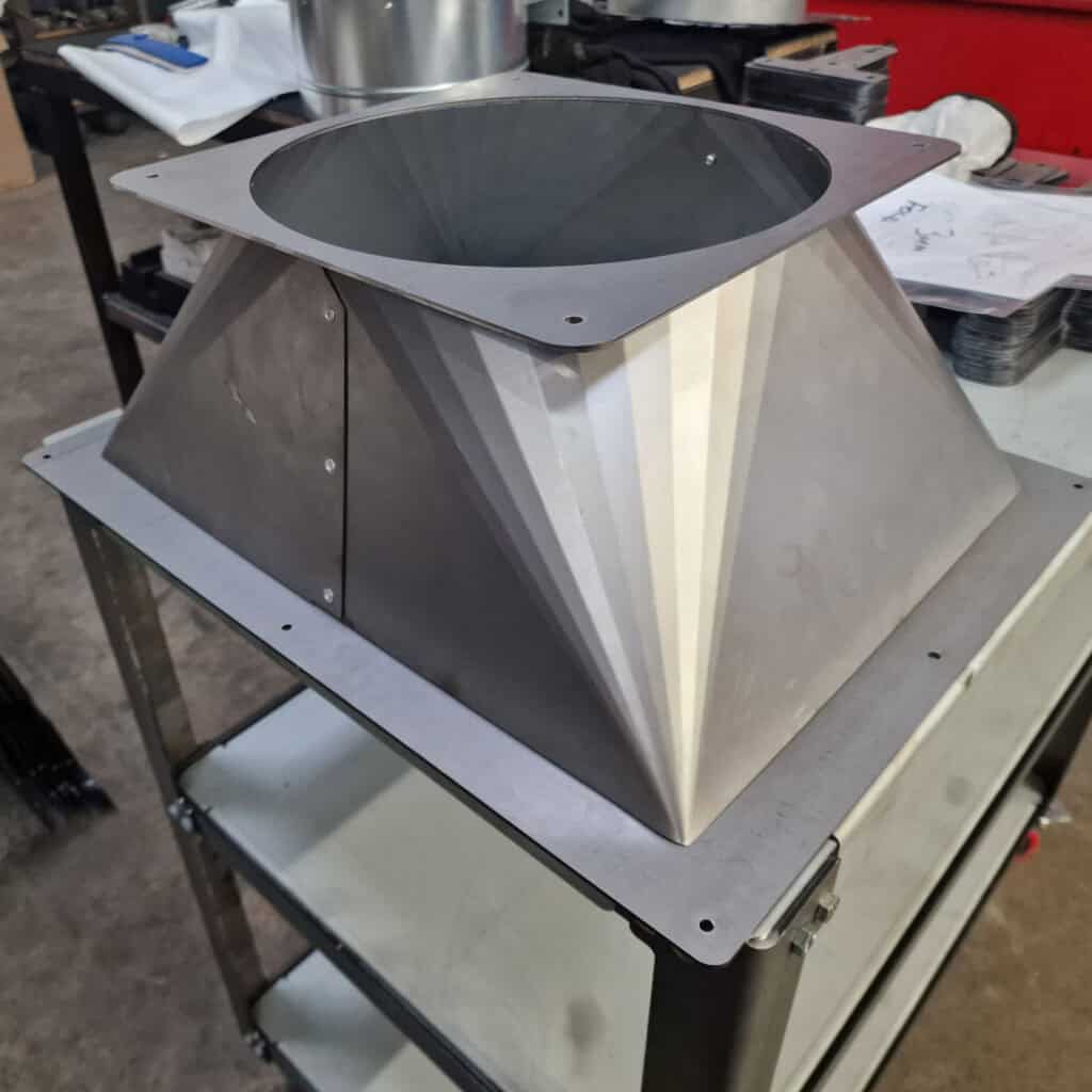 Sheet metal square to round HVAC duct transition